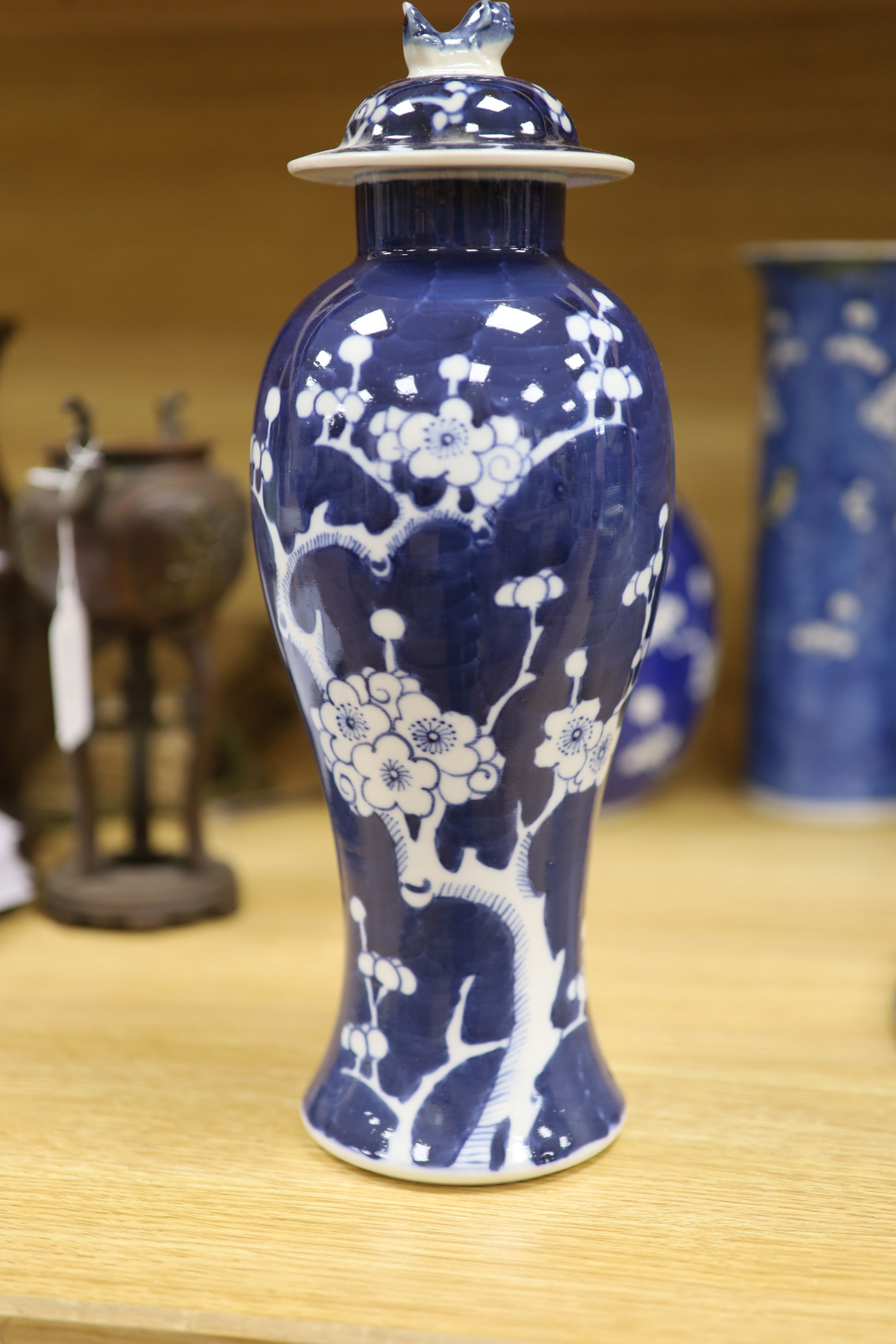 A Chinese blue and white cylindrical vase, another vase and cover and a blue and white jar and cover, together with a cloisonne vase and a bronze censer, tallest 32cm